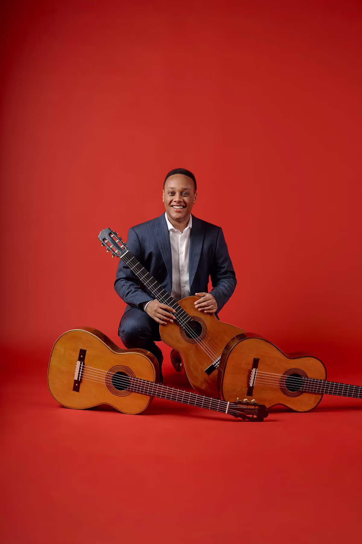 Portrait of Raphaël Feuillâtre with his guitars