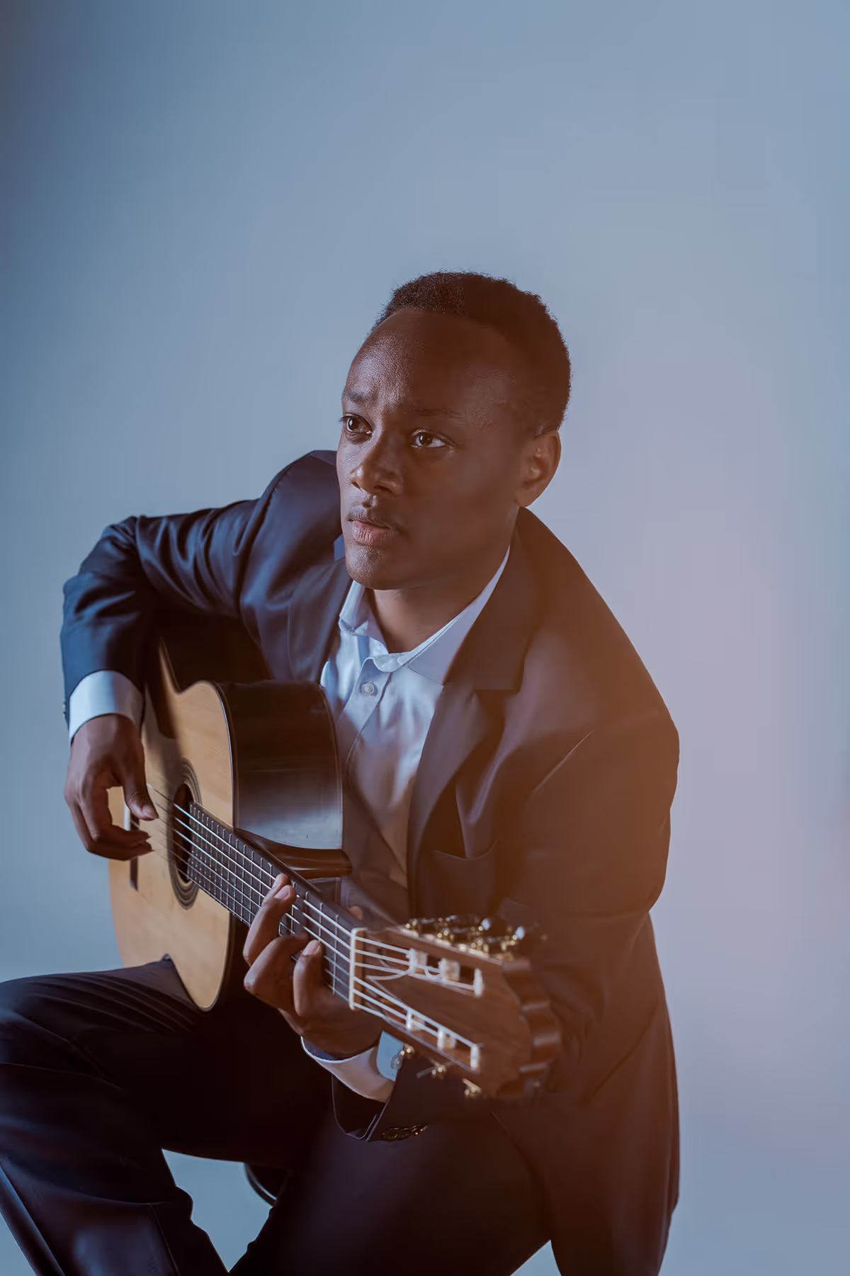 Portrait of Raphaël Feuillâtre with his guitar